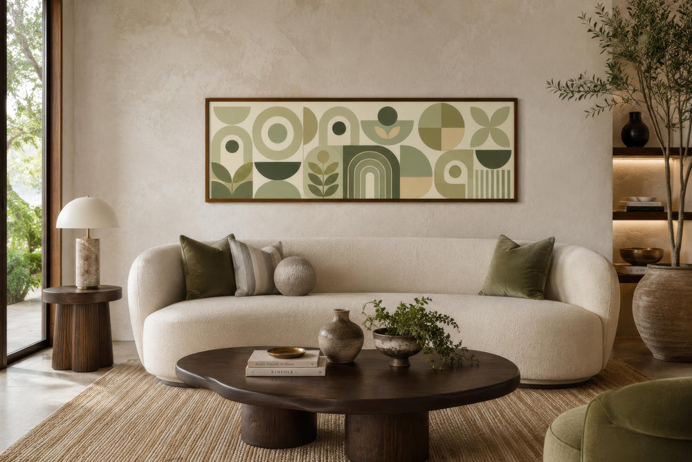 Long narrow sage green geometric Bauhaus canvas wall art hanging above a modern cream sofa.