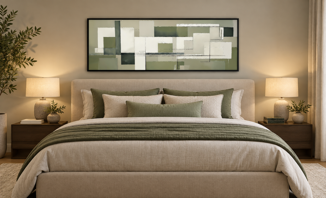 Sage green geometric Bauhaus horizontal wall art in a black frame above a bed in a modern bedroom.