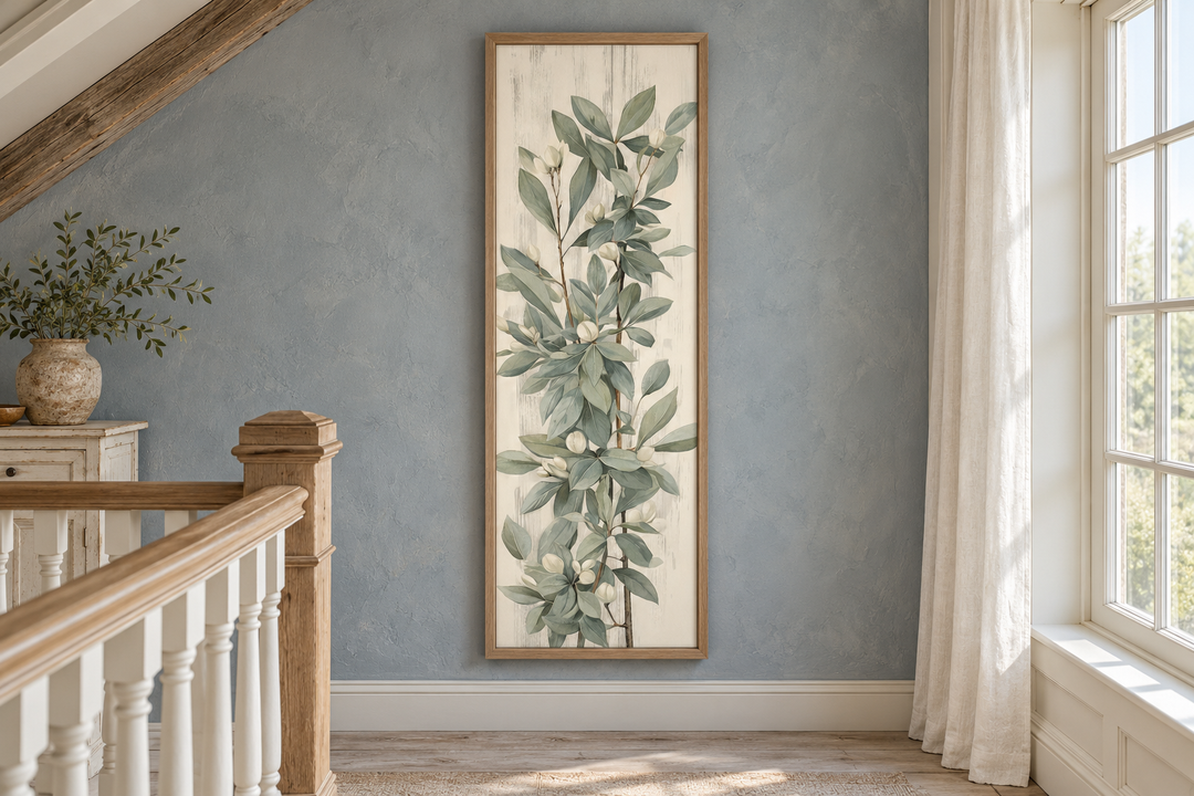 Tall slim vertical framed canvas wall art featuring vintage sage green botanical leaves.