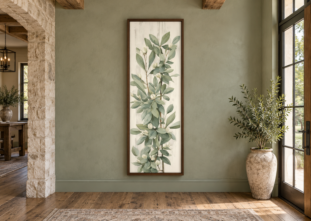 Tall slim vertical framed canvas wall art featuring vintage sage green leaves on a neutral backdrop.