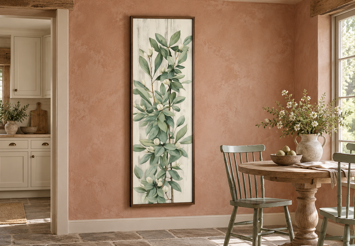 Tall slim vertical framed canvas wall art featuring vintage sage green leaves on a neutral backdrop.