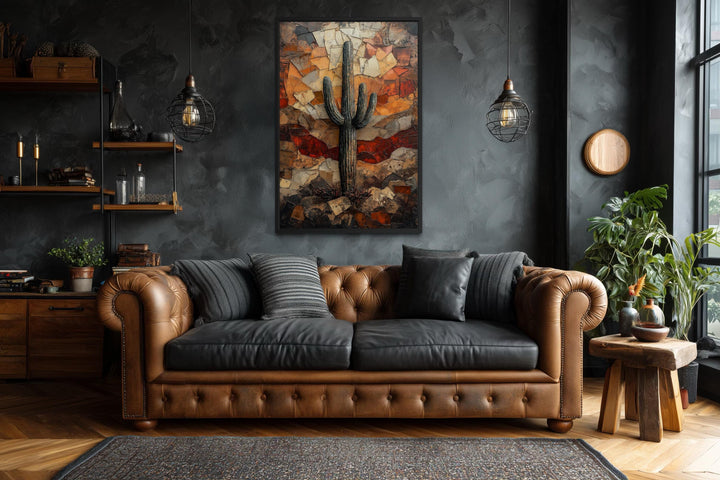 Saguaro Cactus Wall Art canvas print in a rustic living room with a brown leather sofa.