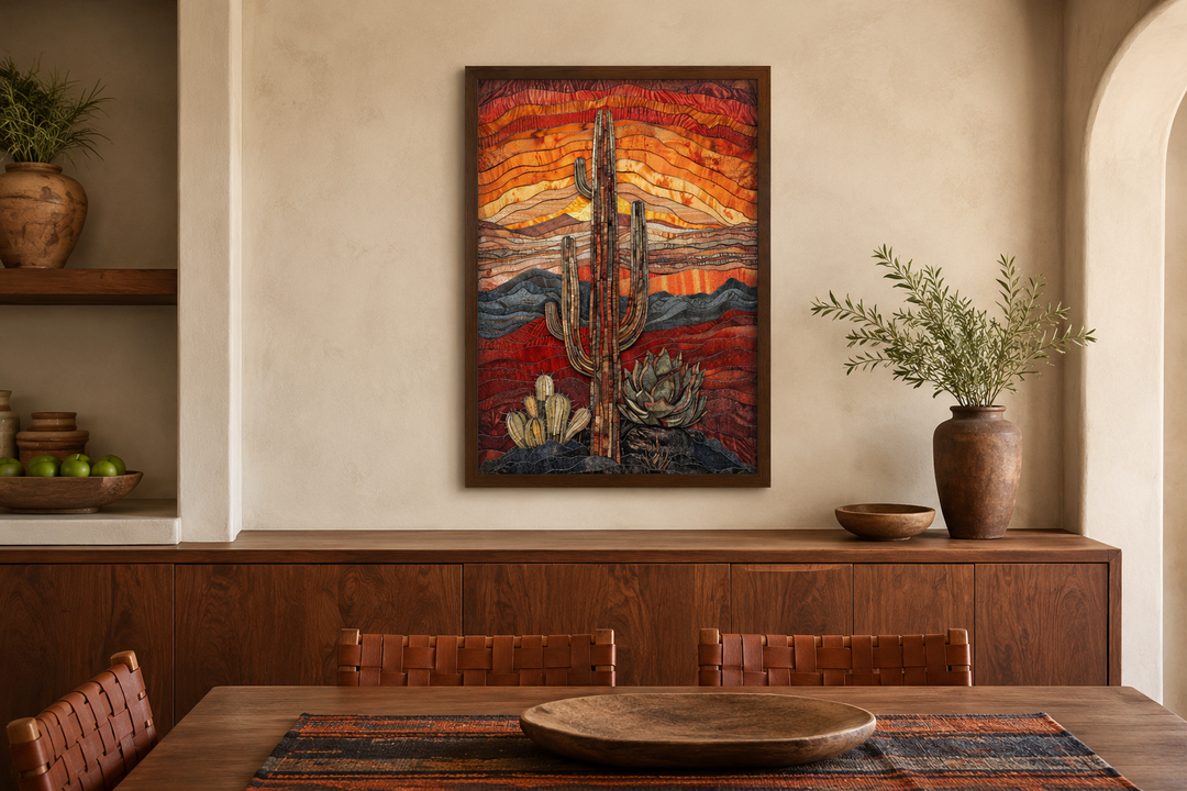 Framed mosaic-style wall art of a saguaro cactus in a burgundy, red, and sage green desert sunset.