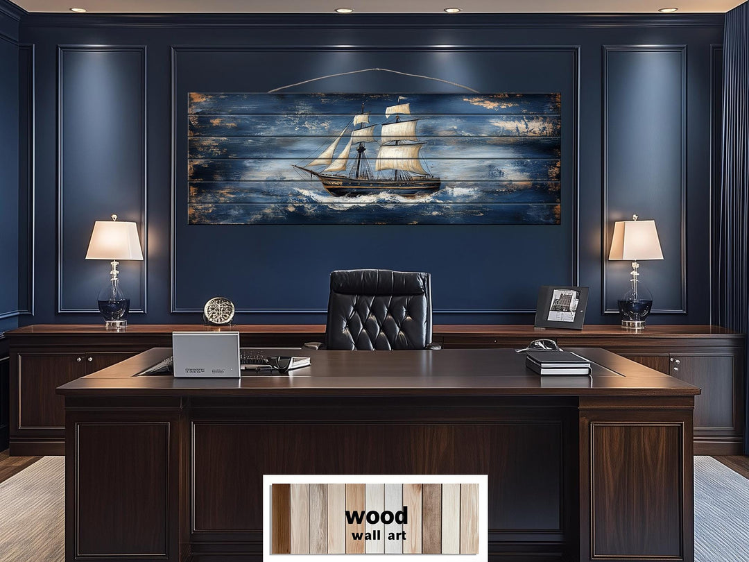 Sailing ship nautical long narrow distressed wood wall art hanging in a dark blue office.