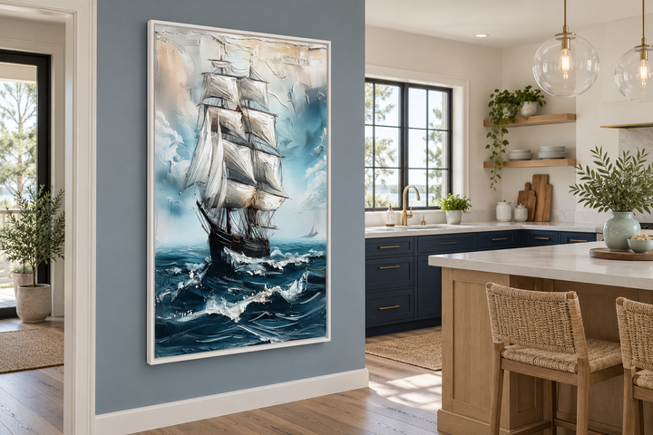 Sailing ship in blue ocean abstract coastal wall art in a white frame on a blue kitchen wall.