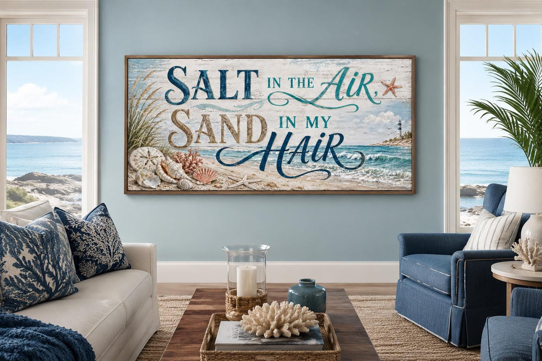 Salt In The Air Sand in My Hair vintage beach sign on a blue wall in a coastal living room.