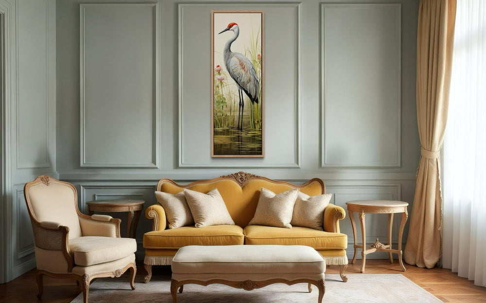 Tall narrow vertical canvas wall art featuring a sandhill crane in a lush wetland habitat.