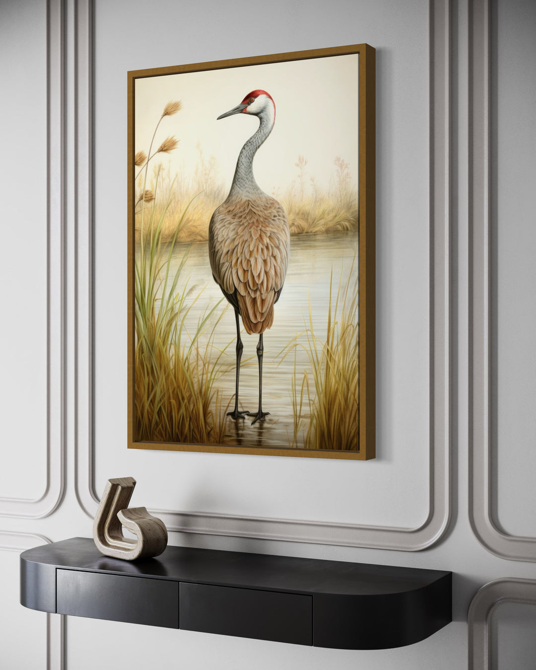 Sandhill Crane Vintage Framed Canvas Wall Art hanging above a black console table.