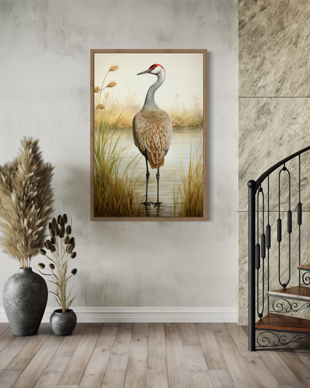Sandhill Crane Vintage Framed Canvas Wall Art in a modern room with stairs and pampas grass.