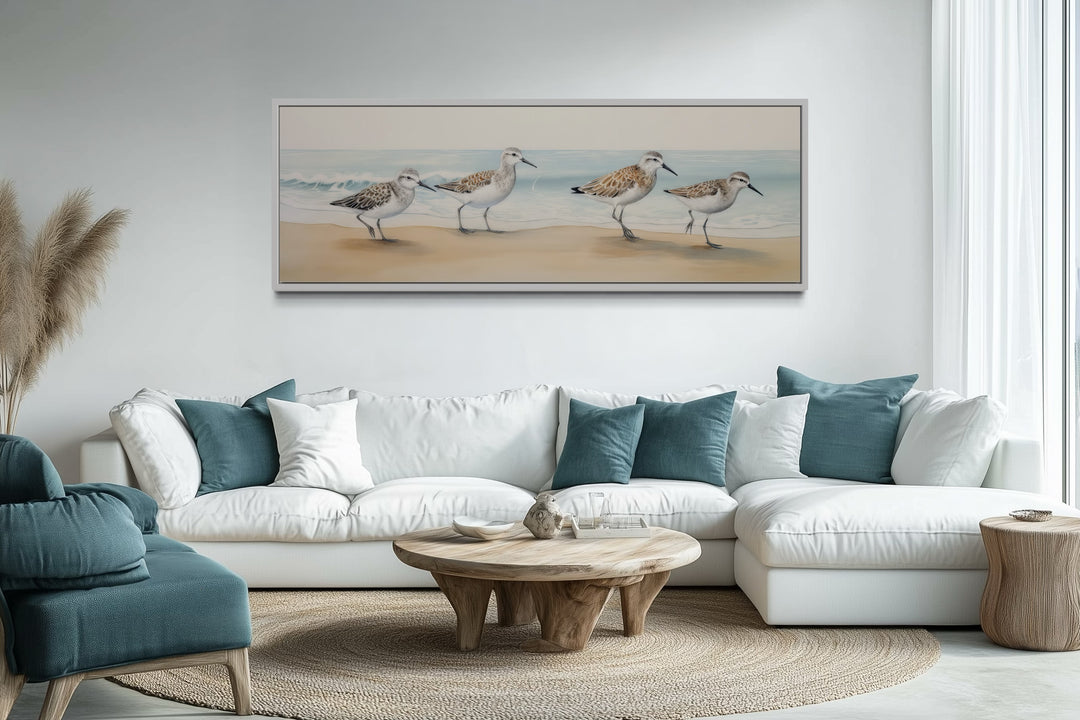 Sandpipers walking on the beach horizontal framed canvas wall art.