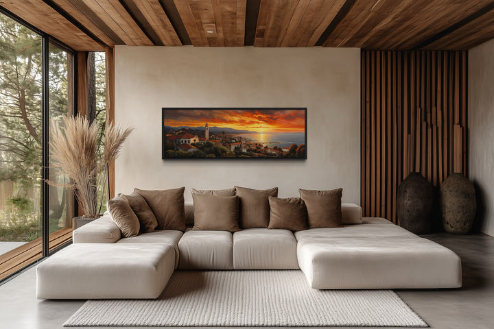 Santa Barbara At Sunrise Framed Horizontal Wall Art above a modern sectional sofa in a living room.