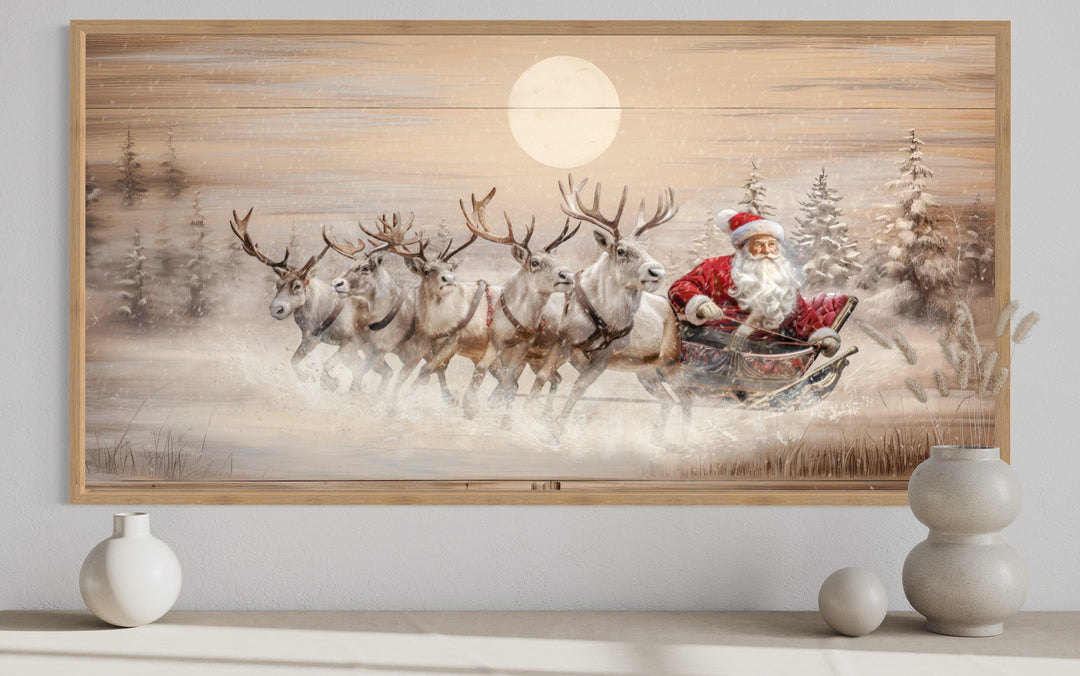 Rustic Santa Claus in a sleigh with reindeer wall art on a wooden-textured canvas.