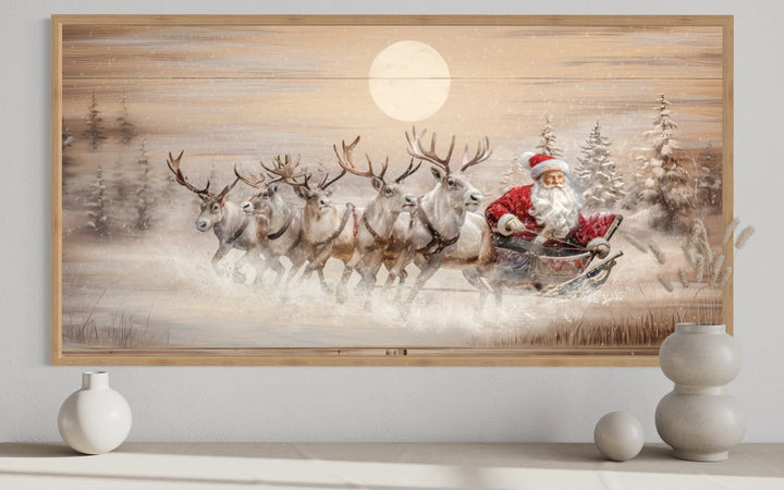Rustic Santa Claus in a sleigh with reindeer wall art on a wooden-textured canvas.