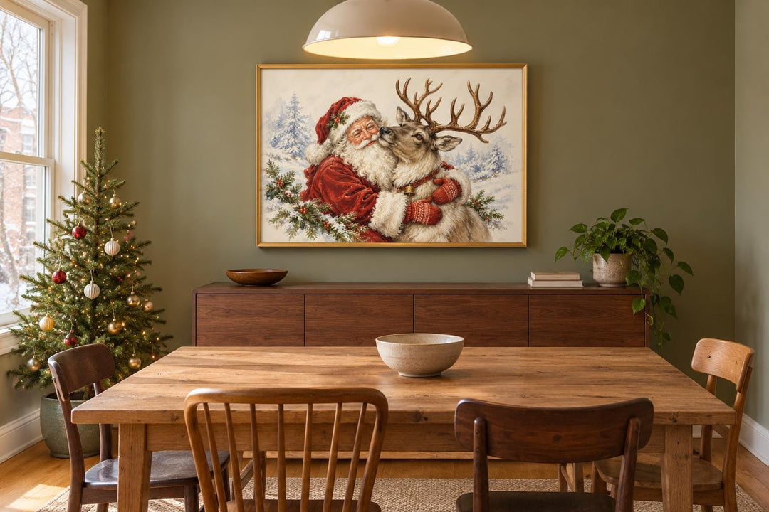 Weihnachtsmann mit Rentier – Leinwandbild mit Rahmen