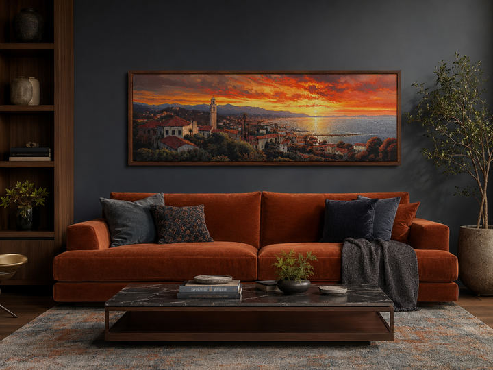 Santa Barbara At Sunrise Framed Horizontal Wall Art above a burnt orange sofa in a dark room.