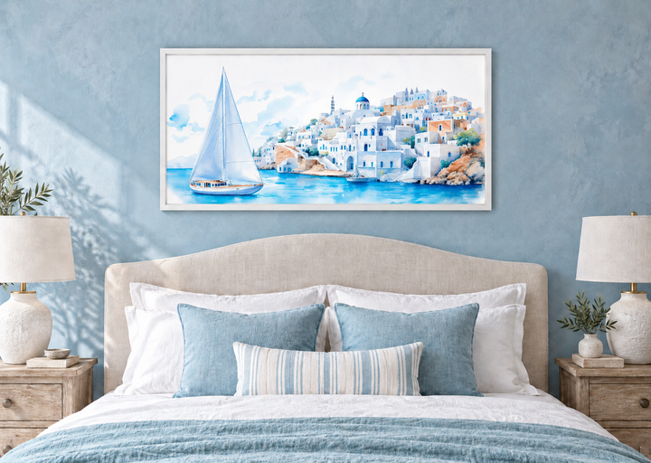 Santorini Sea and Sailboat Framed Canvas Wall Art above a bed in a blue-walled bedroom.