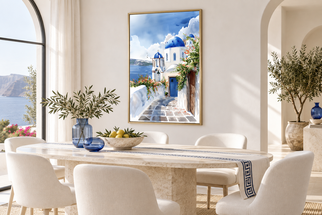 Santorini Greece watercolor wall art featuring blue-domed buildings in a bright dining room.
