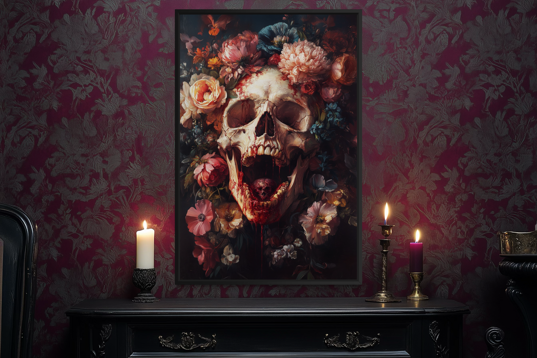 a dark and moody scene with a large framed painting of a skull surrounded by a vibrant floral arrangement. The painting is displayed on a wall, and there are two lit candles and a black dresser in the foreground.