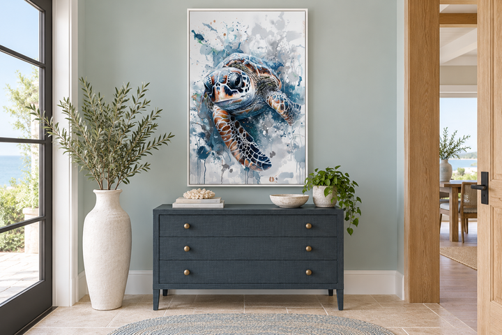 Blue sea turtle framed canvas wall art hanging above a navy dresser in a coastal entryway.