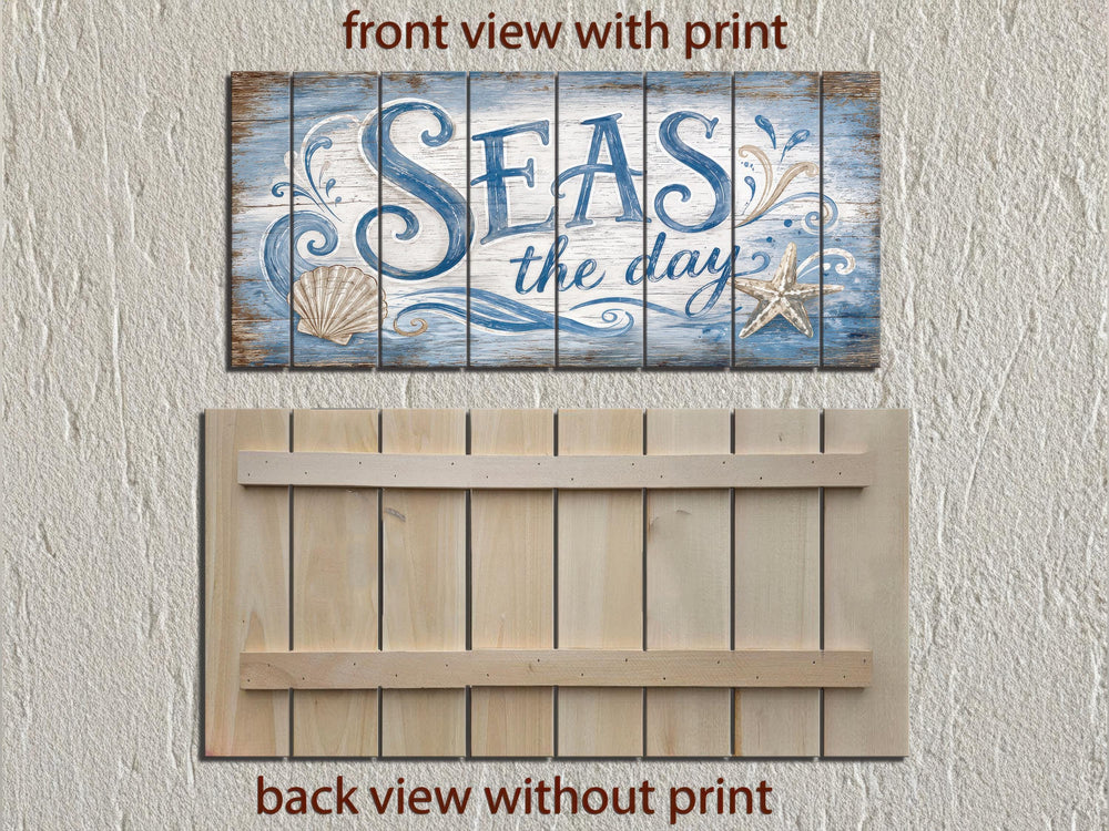 Coastal wood wall art featuring Seas the Day text with shells and starfish on weathered planks.
