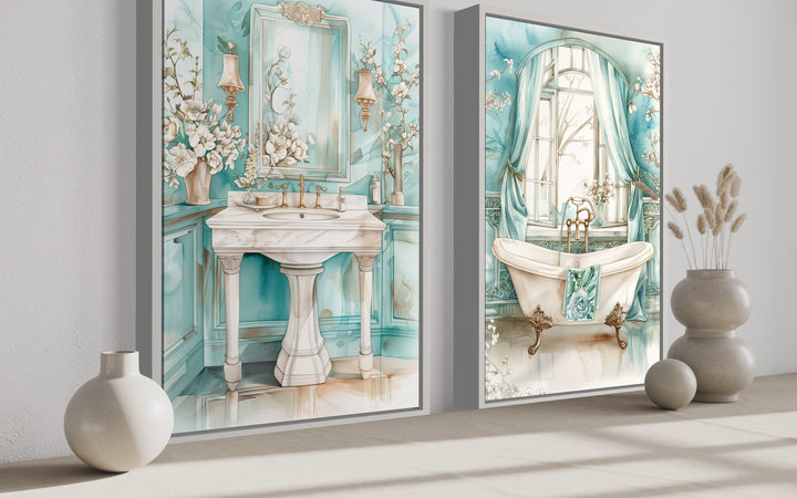 Set of two teal chinoiserie wall art prints featuring a vintage pedestal sink and clawfoot bathtub.