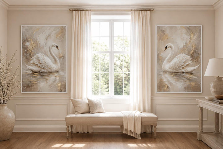 Set of 2 white swan canvas art prints with gold accents in a neutral glam bedroom setting.