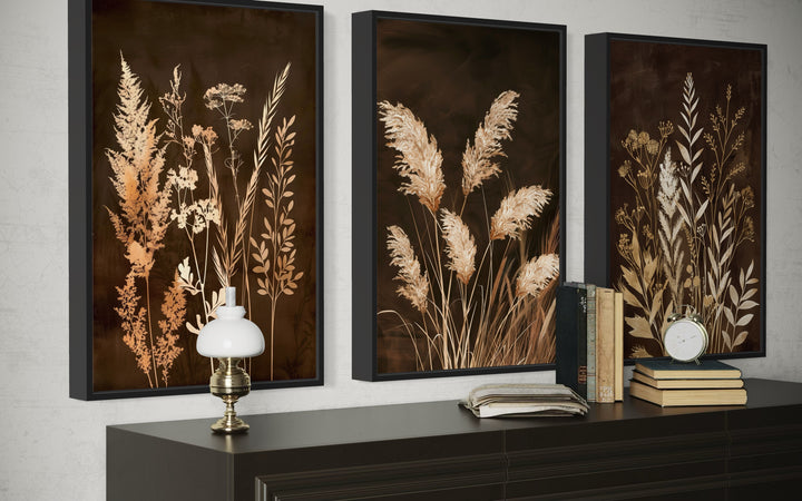 Set of 3 vertical canvas wall art featuring botanical grass in brown and beige earth tones.