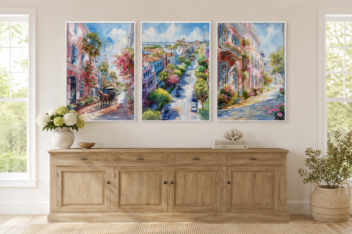 Set of three framed watercolor canvas prints featuring vibrant Charleston city street scenes.
