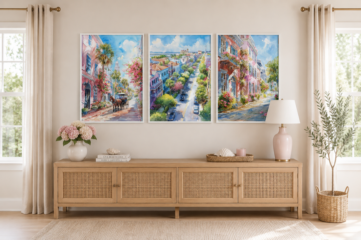 Set of three framed watercolor canvas prints featuring historic Charleston city street scenes.