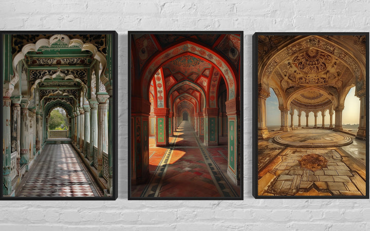 Set of three framed canvas prints featuring colorful Mughal architecture on a white brick wall.