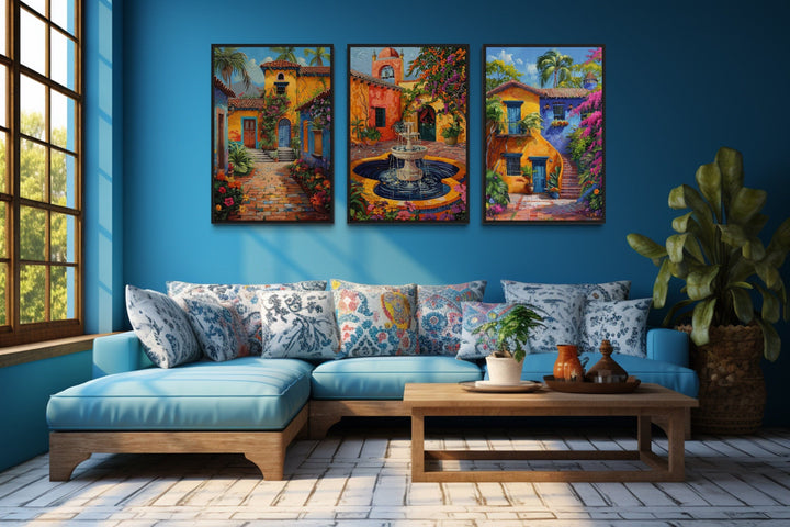 Set of three framed canvas prints featuring colorful Mexican courtyard gardens and fountains.