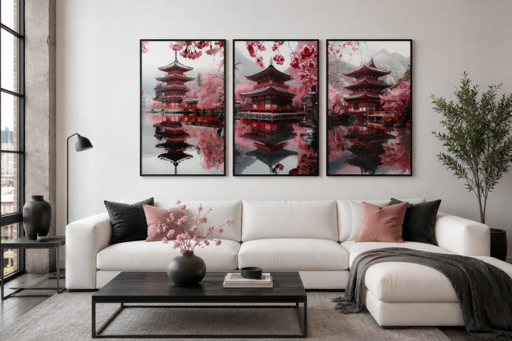 Set of three framed wall art pieces featuring Japanese pagodas and pink cherry blossoms.