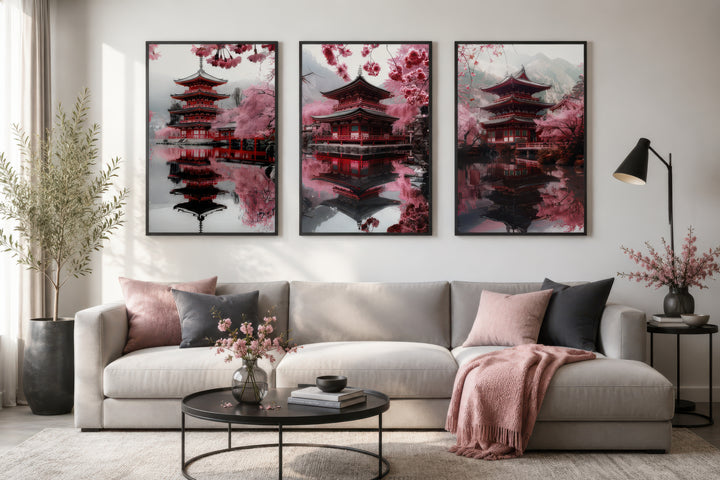Set of three framed wall art pieces featuring Japanese pagodas and pink cherry blossoms.