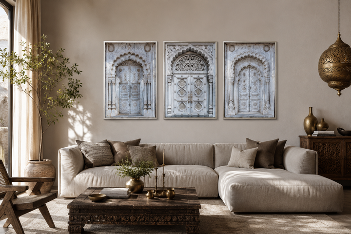 Set of three framed canvas prints featuring intricately carved neutral grey Indian doors.