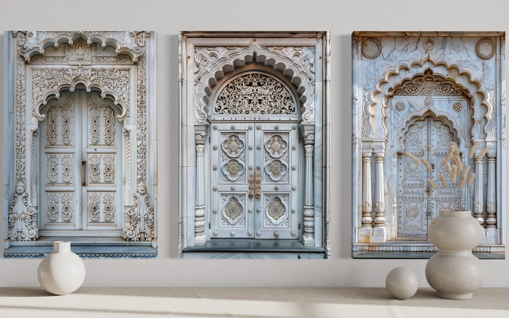 Set of three framed canvas prints featuring intricately carved neutral grey Indian doors.