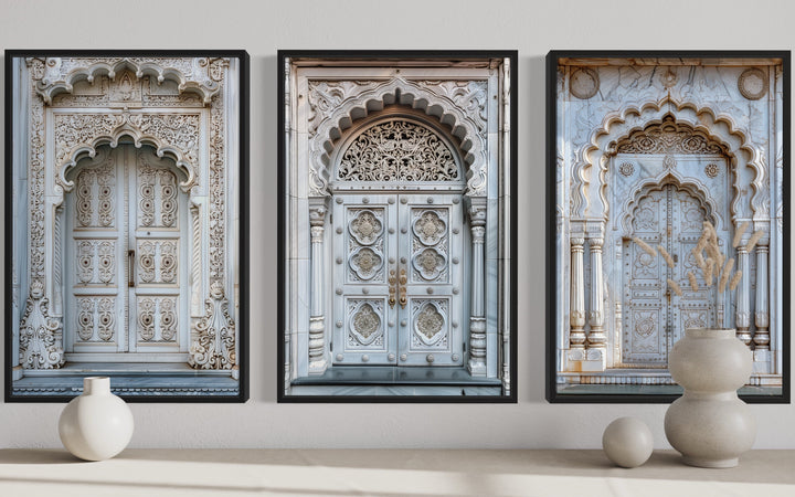 Set of three framed canvas prints featuring intricately carved neutral grey Indian doors.
