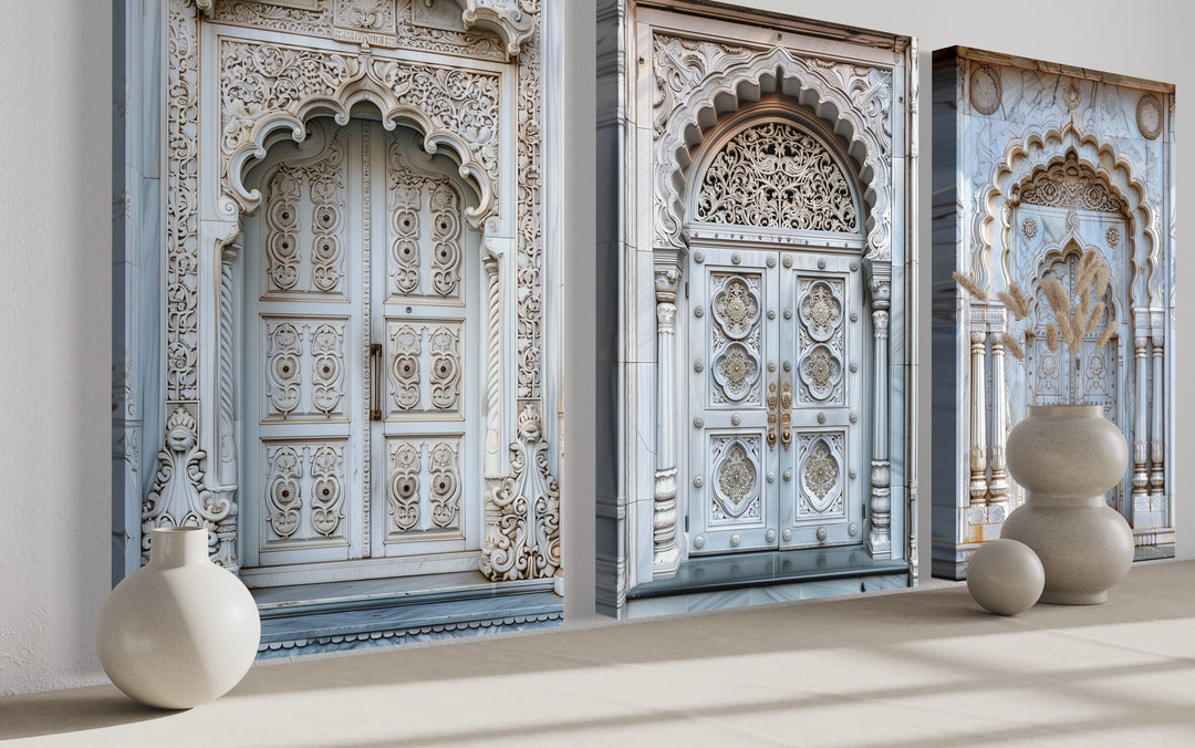 Set of three framed canvas prints featuring intricately carved neutral grey Indian doors.