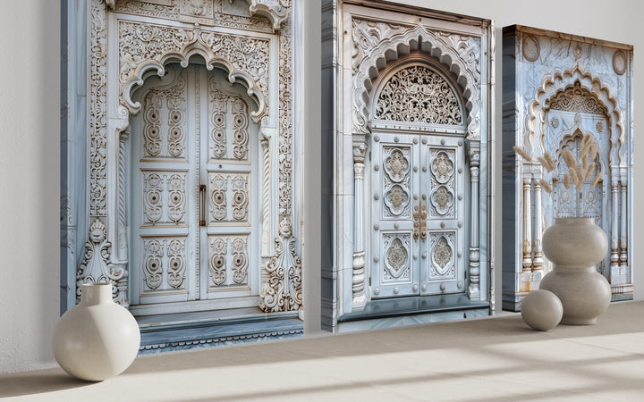 Set of three framed canvas prints featuring intricately carved neutral grey Indian doors.