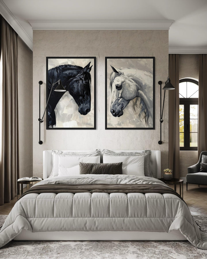 Set of 2 framed canvas wall art prints featuring black and white horse portraits above a bed.