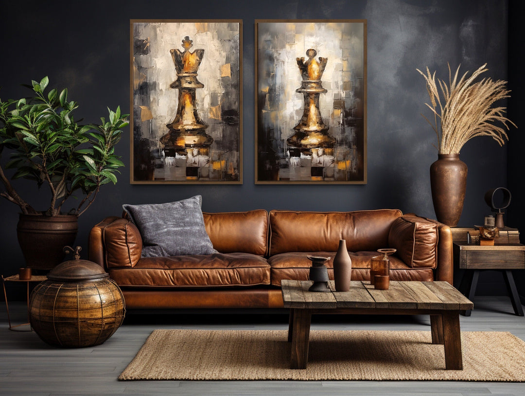 Set of 2 framed canvas wall art featuring golden chess king and queen pieces on a dark wall.