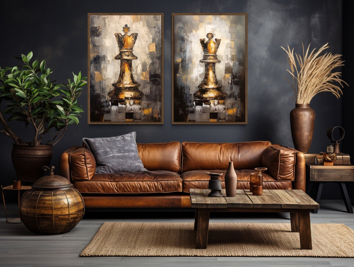 Set of 2 framed canvas wall art featuring golden chess king and queen pieces on a dark wall.