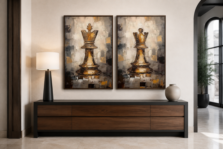 Set of 2 framed canvas wall art featuring gold abstract chess king and queen pieces over a console.