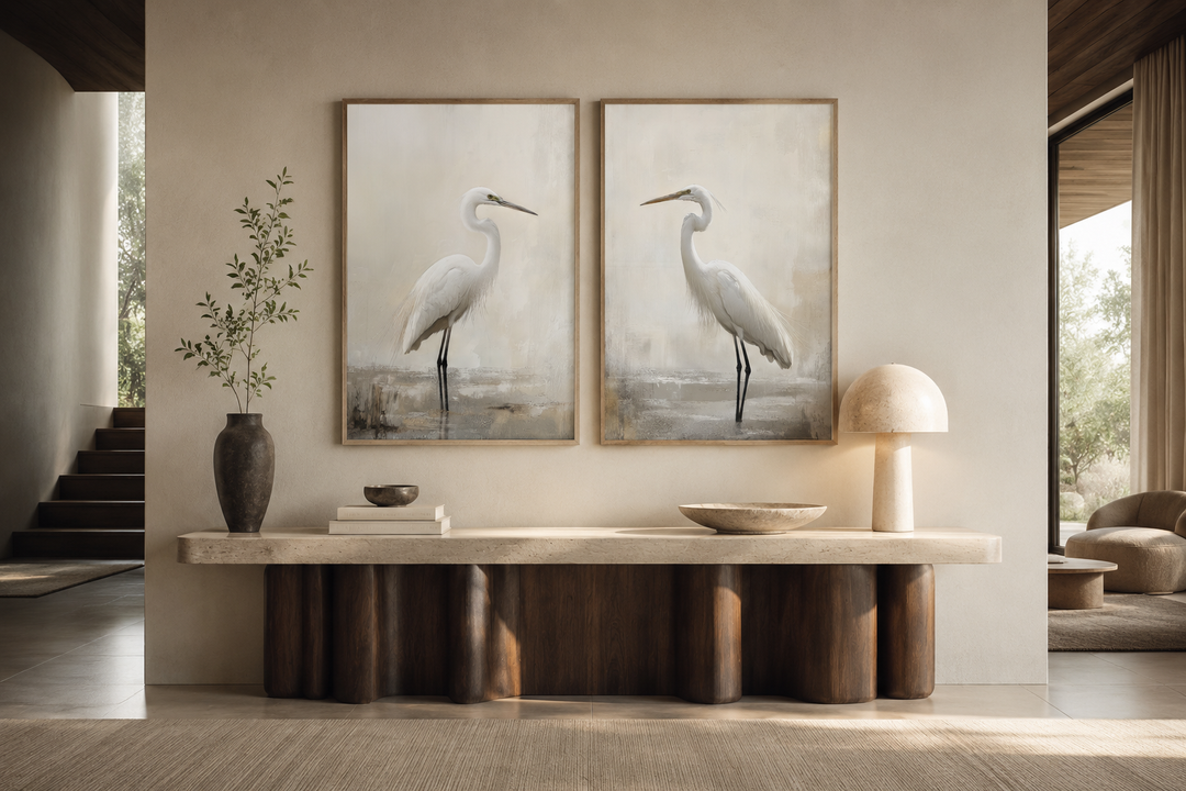 Set of 2 framed canvas wall art pieces featuring white great egrets on a neutral beige background.