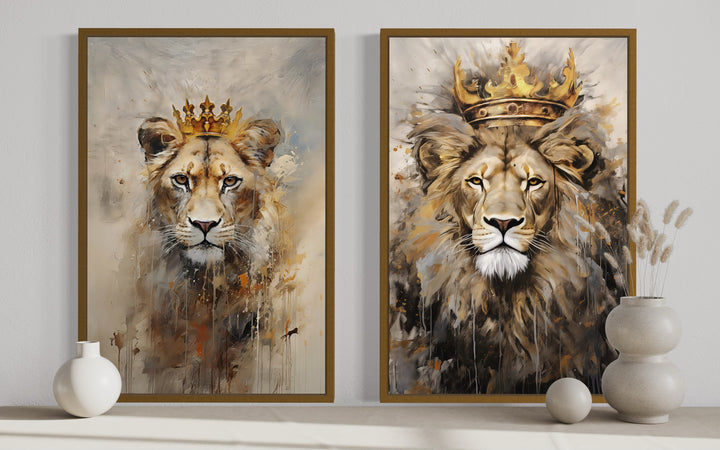 Set of 2 framed canvas prints featuring a lion and lioness wearing golden crowns in a painterly style