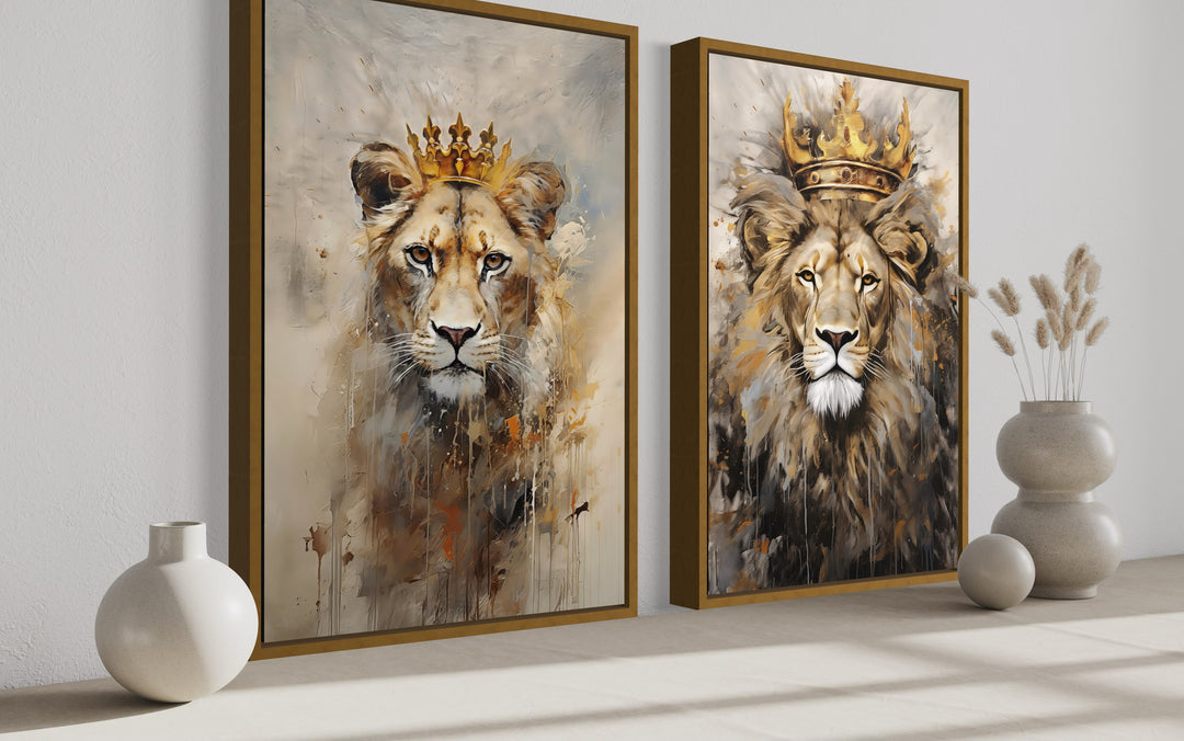 Set of 2 framed canvas prints featuring a lion king and lioness queen with golden crowns.