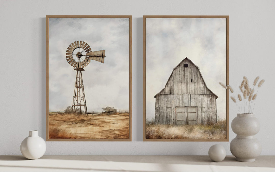 Set of 2 framed rustic farmhouse wall art prints featuring a weathered barn and a windmill.