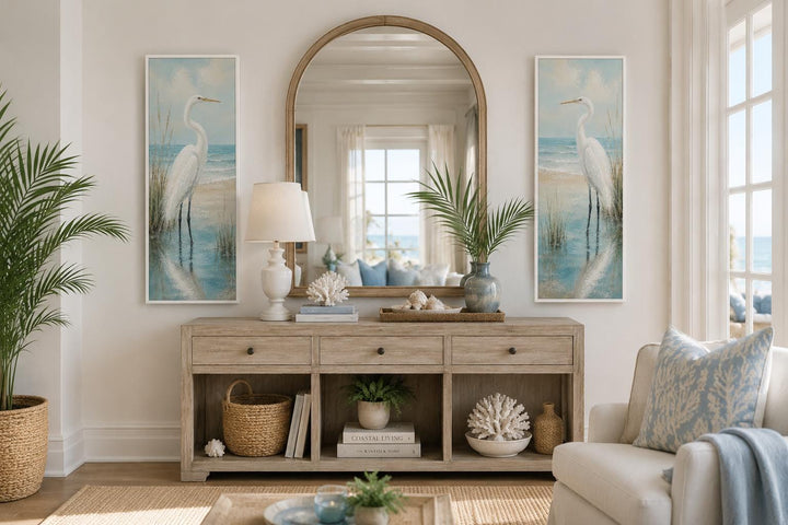 Set of 2 tall narrow canvas prints featuring white egrets in a coastal setting flanking a mirror.