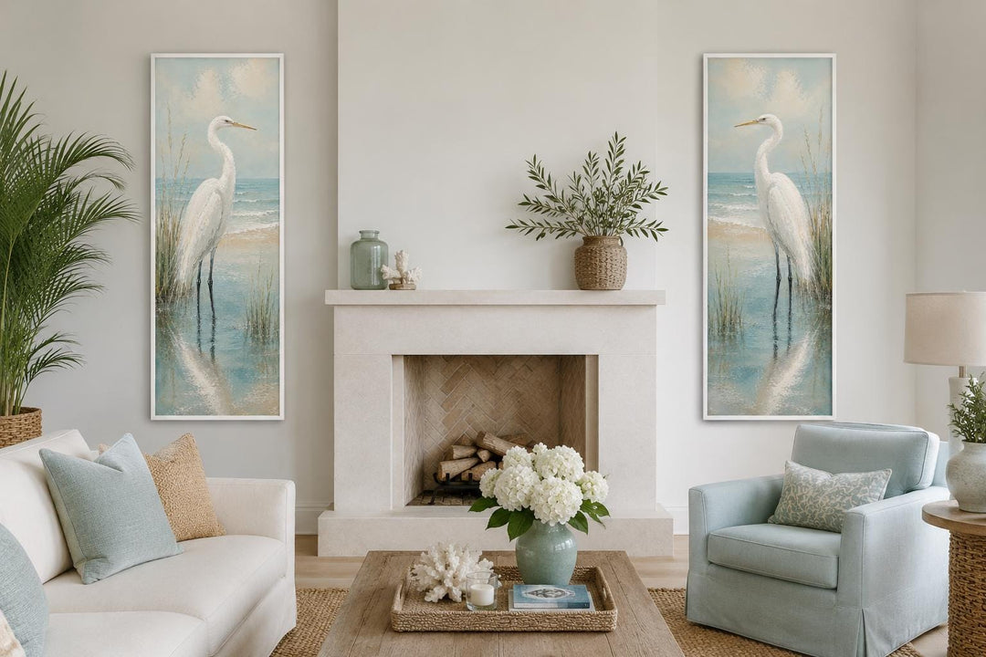 Set of 2 tall narrow canvas prints featuring white egrets in a coastal setting over a fireplace.