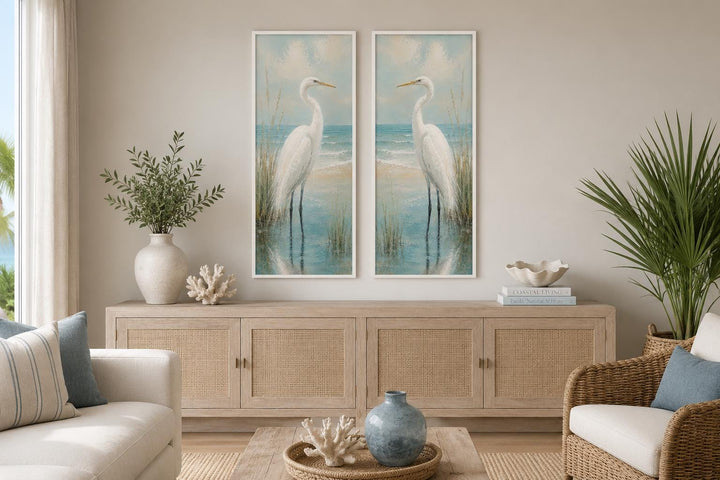 Set of two tall narrow canvas prints featuring white egrets in a coastal setting with muted tones.