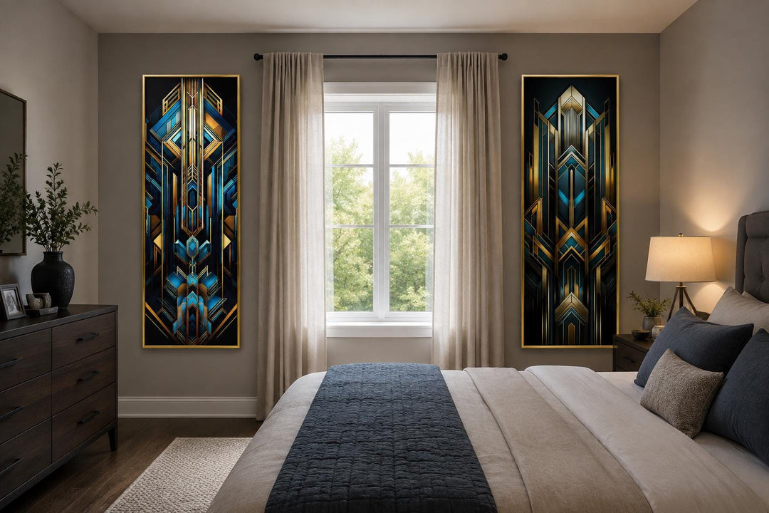 Set of 2 tall vertical Art Deco geometric canvas panels in navy blue and gold in a bedroom.